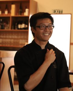 Chef Kosuke smiling